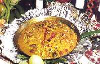 Arroz y conejo con caracoles