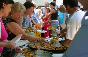  Reparto de las paellas 