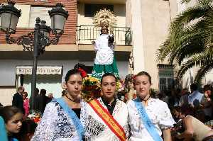 Reina y damas  con la patrona 